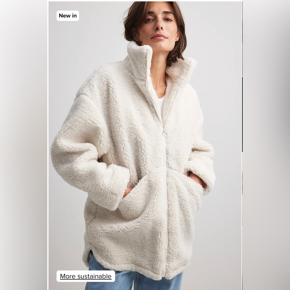 Long zipped teddy jacket in off white - NAKD